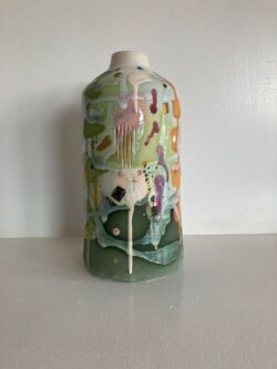 Earthenware, coloured slips, oxides, underglazes and lustres, 25cmH. SOLD
