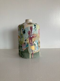 Earthenware, coloured slips, oxides, underglazes and lustres, 19cmH. SOLD