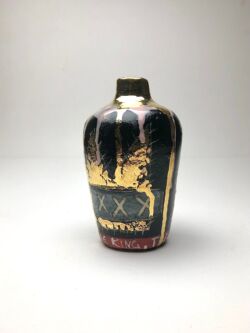 Earthernware, underglazes, and golden lustre, 14cmH x 9.5cmW. SOLD