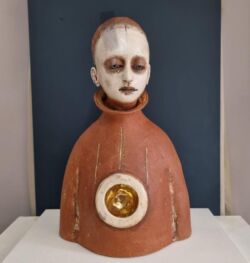 Mixed clays, gold lustre and glass eyes, approx 40cmH x 25cmW x 21cmD. SOLD